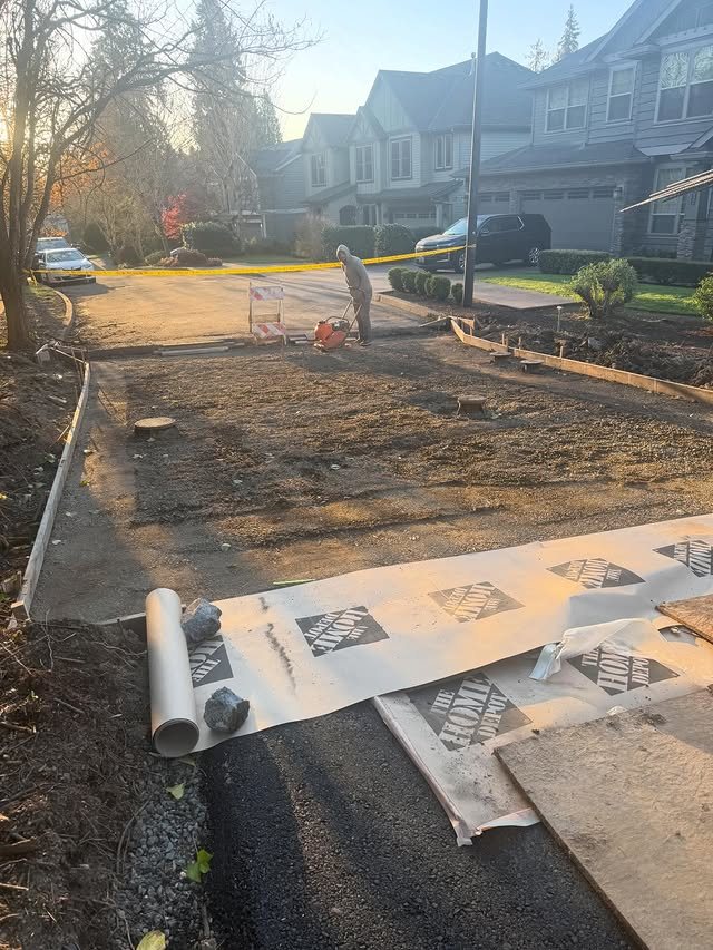 Flatline Concrete prepping a residential driveway pour in an Oregon neighborhood